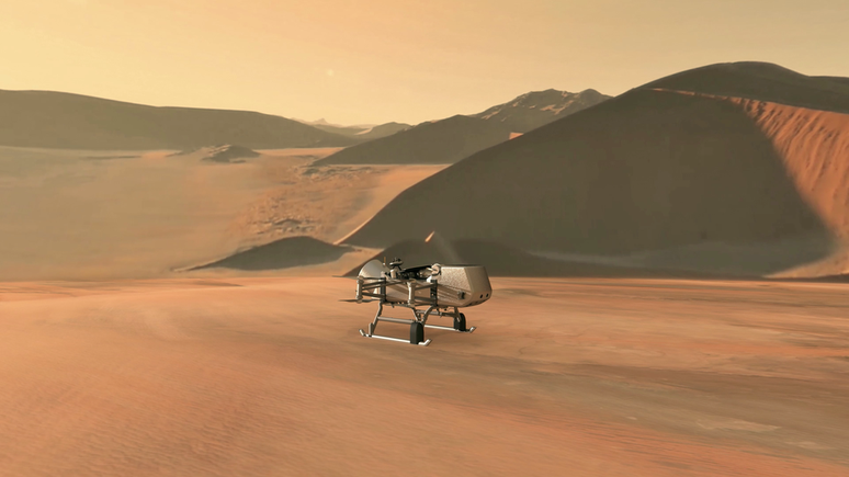 Representação da Dragonfly, aeronave que deve explorar a lua Titã na próxima década (Imagem: Reprodução/NASA/Johns Hopkins APL/Steve Gribben)
