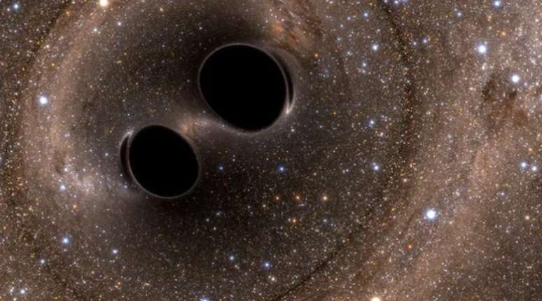  Ilustração mostra dois buracos negros colidindo e se fundindo