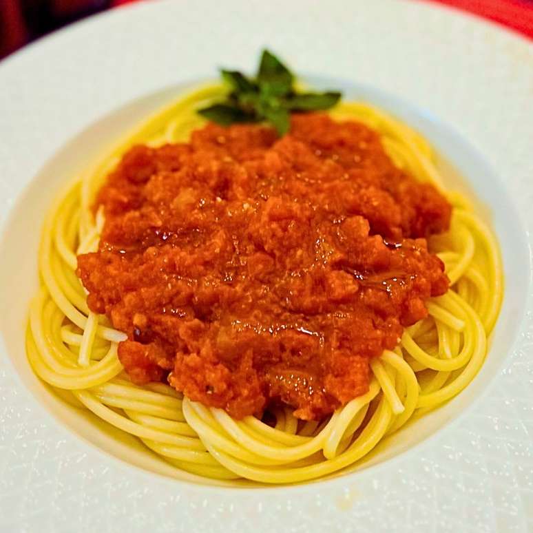 Homemade tomato sauce from an Italian canteen, under pressure