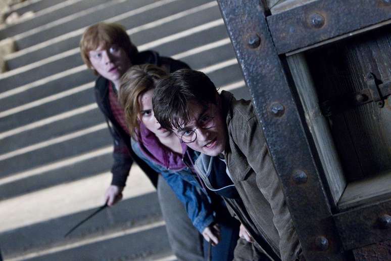 Rupert Grint, Emma Watson e Daniel Radcliffe em cena de Harry Potter (Imagem: Divulgação/Warner Bros. Pcitures)