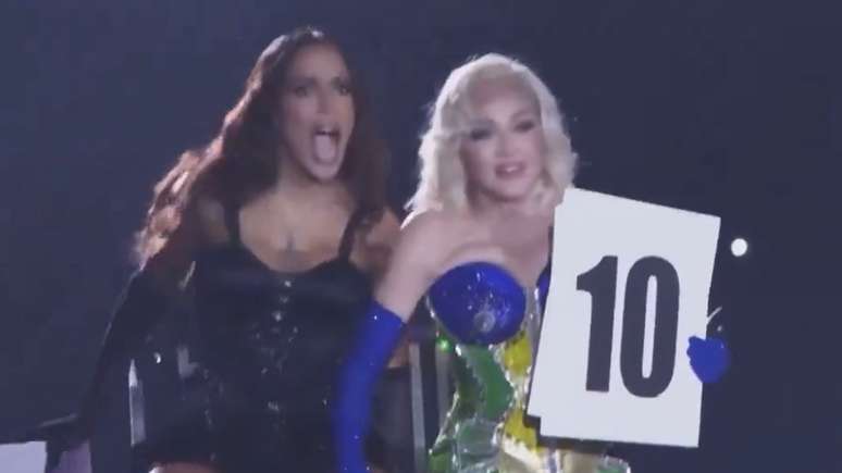 In a quick participation, Anitta does not sing, is led by Madonna and is the protagonist of a hot scene
