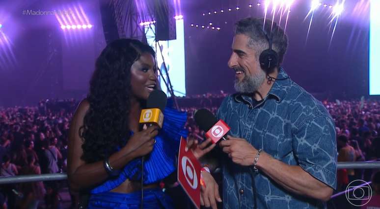 Kenya Sade e Marcos Mion ancoraram a transmiss&atilde;o do show hist&oacute;rico de Madonna