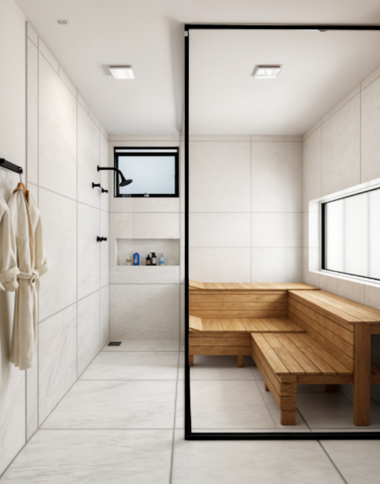 13. Neste projeto moderno, o box at&eacute; o teto contempla o chuveiro e a sauna &ndash; Projeto: Golden Key Arquitetura