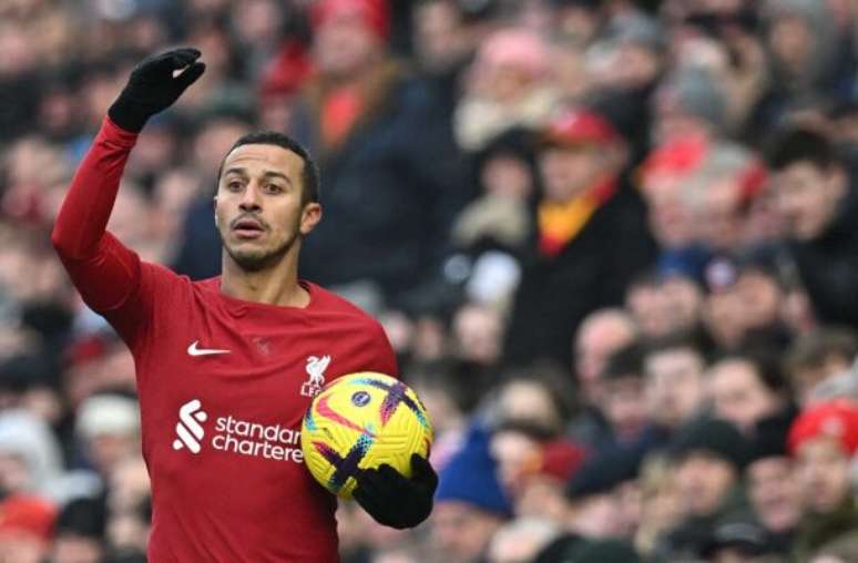 Paul Ellis/AFP via Getty Images - Legenda: Thiago tem 98 partidas pelo Liverpool