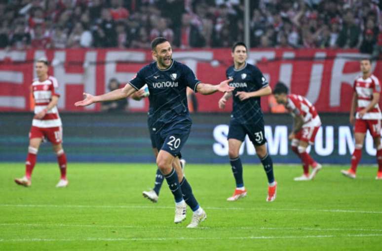 Uwe Kraft/AFP via Getty Images - Legenda: Momento do gol marcado por Kevin Stoeger -