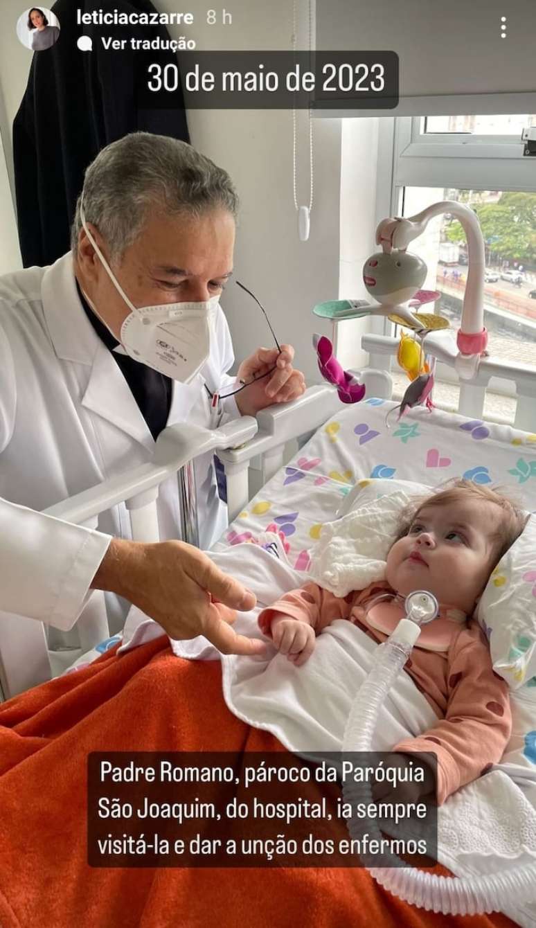 Padre Romano em visita a Maria Guilhermina no hospital