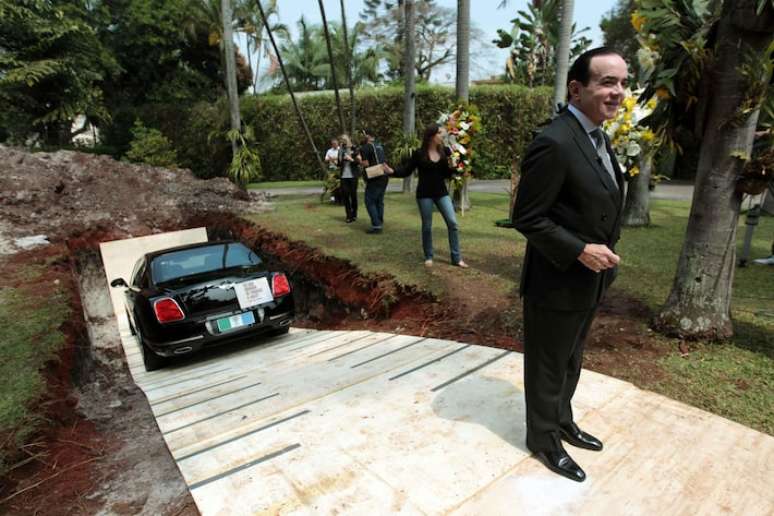 Chiquinho Scarpa during a mock burial of his Bentley in September 2013 Chiquinho Scarpa during a mock burial of his Bentley in September 2013