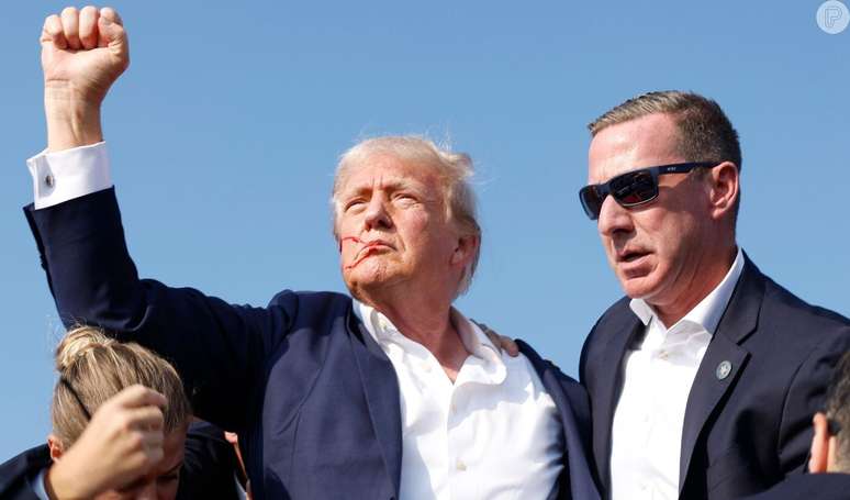 URGENT! Donald Trump is rescued bloodied after alleged gunshot wounds during a rally. Find out the health status of the former US president