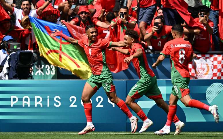 Jogadores de Marrocos celebram gol contra a Argentina