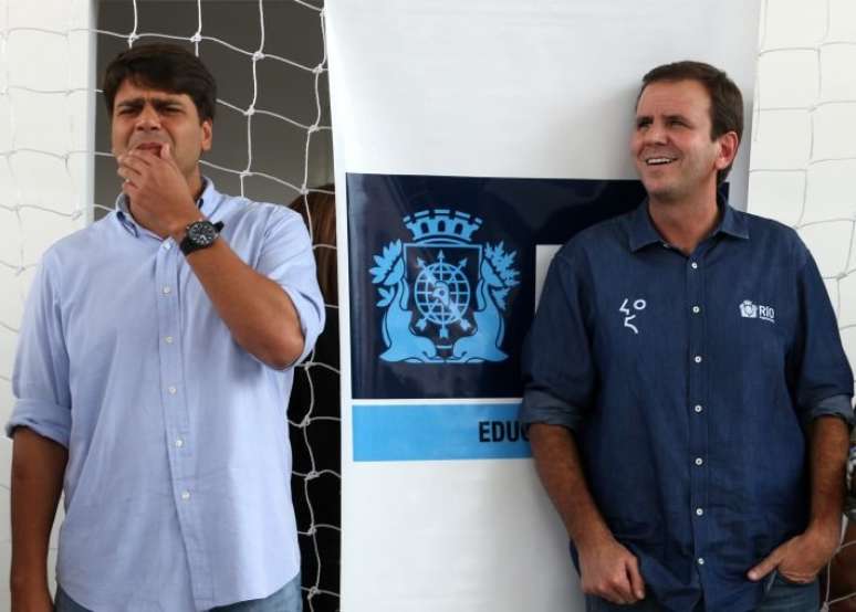 Pedro Paulo (à esq) e Eduardo Paes.