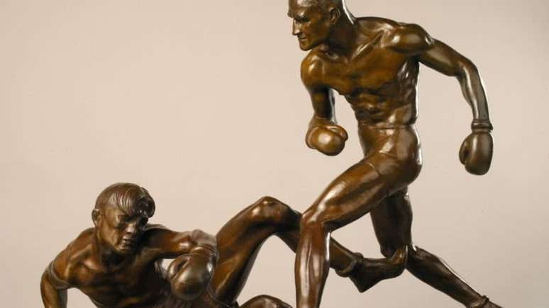 Escultura The Knockdown feita por Mahonri Young, dos EUA, leva ouro nos Jogos de 1932