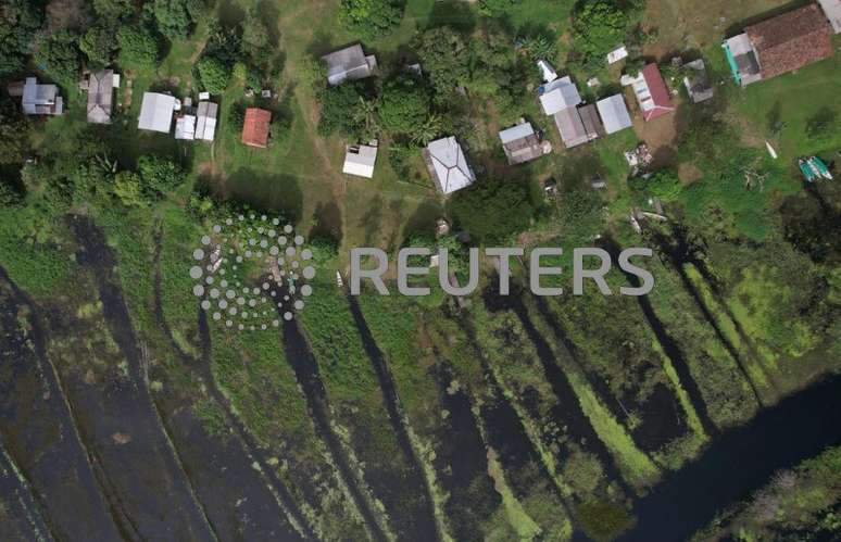 Vista de drone mostra a aldeia Santa Izabel na terra indígena Uaçá, perto da foz do Amazonas em Oiapoque, Estado do Amapá
23/03/2024
REUTERS/Adriano Machado