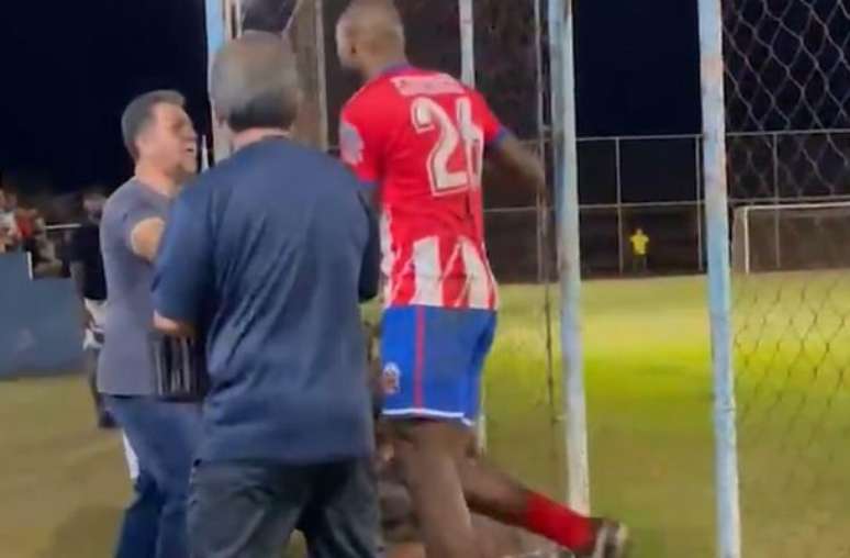 Football match ends after fan hurls racist insults