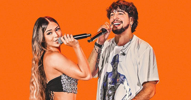 Nattan, ao piano, aparece com Melody cantando 'Vou Sentar'