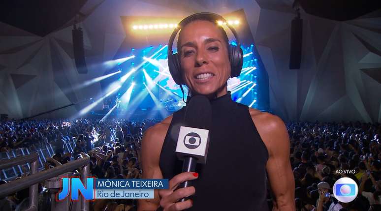 Atleta, a repórter exibiu a boa forma ao falar diretamente do 'Rock in Rio' no 'Jornal Nacional'