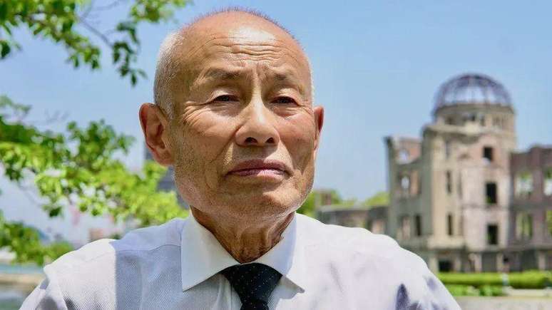 O co-diretor do grupo, Toshiyuki Mimaki, é um dos sobreviventes do ataque dos EUA a Hiroshima, em 1945