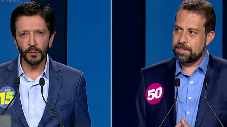 Ricardo Nunes (MDB) und Guilherme Boulos (PSOL) während der Debatte am Samstagabend, 19