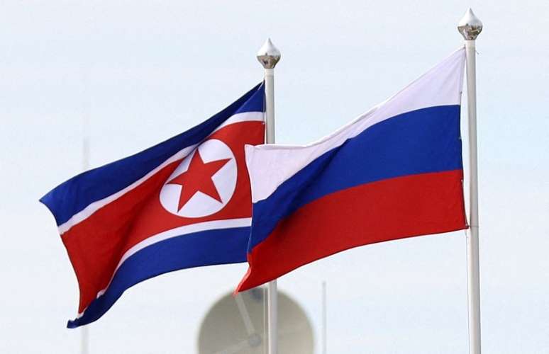 Bandeiras da Rússia e da Coreia do Norte
13/09/2023
Sputnik/Artem Geodakyan/Pool via REUTERS