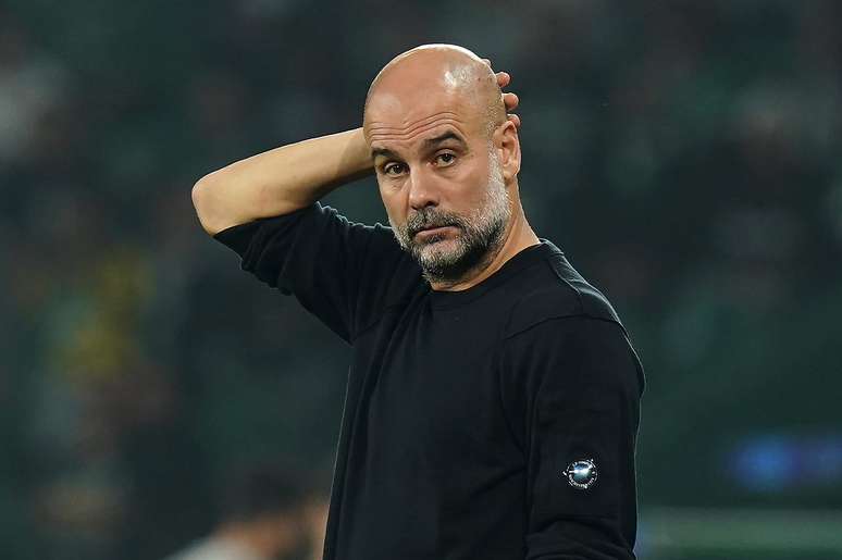 Guardiola está em fim de contrato com o Manchester City – (Photo by Gualter Fatia/Getty Images)