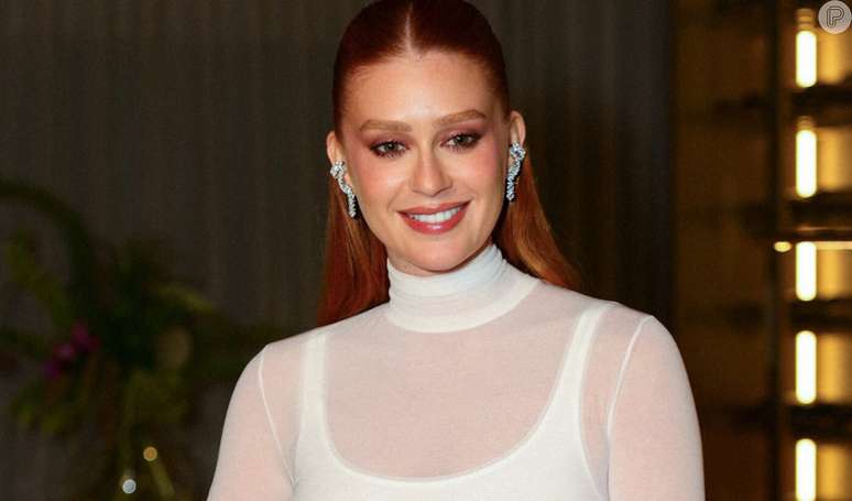 Marina Ruy Barbosa apostou em look all white com transparência para evento de grife de joias em 11 de novembro de 2024.