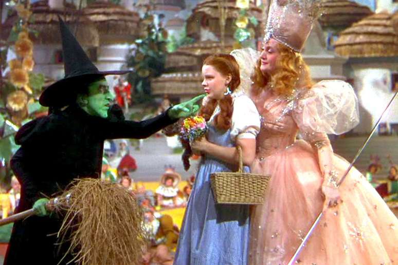 Margaret Hamilton as the Wicked Witch of the West, Judy Garland as Dorothy, and Billie Burke as Glinda the Good Witch in 'The Wizard of Oz' (1939). y Mgm/Kobal/Shutterstock