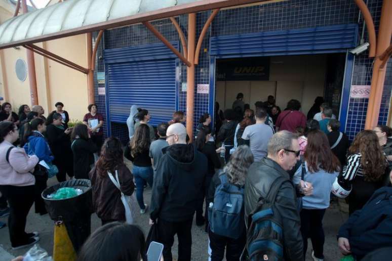 Entrada de candidatos para provas do CNU (Concurso Nacional Unificado) em 17 de agosto; concurso teve que ser adiado por causa das enchentes no Rio Grande do Sul.