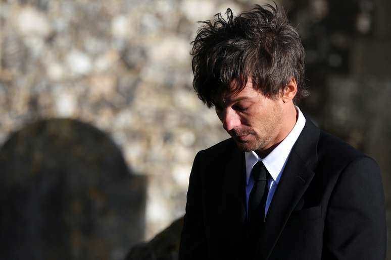Louis Tomlinson leaves after the funeral of former One Direction singer Liam Payne at St. Mary's Church in Amersham, near London, Britain on November 20, 2024