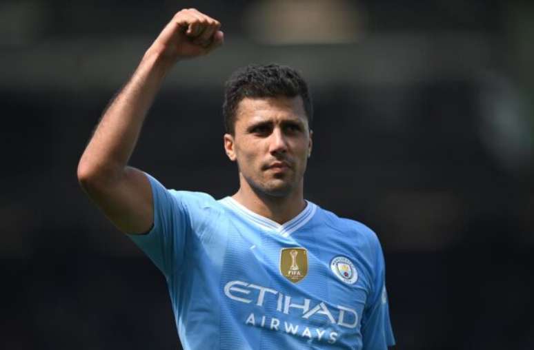 Justin Setterfield/Getty Images) - Legenda: Rodri, do Manchester City