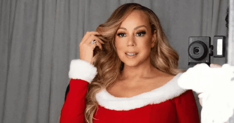 Mariah Carey se atrapalha ao embrulhar presentes