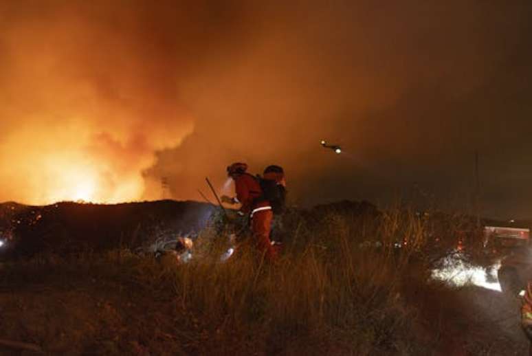 Bombeiros combatem incêndiodono da betspeedPalisades, Los Angeles,dono da betspeedjaneiro de 2025: a Humanidade e o fogo vêm moldando a face da Terra desde a última glaciação, mas escala do uso do fogo mudou com a transição para uma civilização movida a combustíveis fósseis Peyman Fakhraei/Middle East Images/AFP via Getty Images