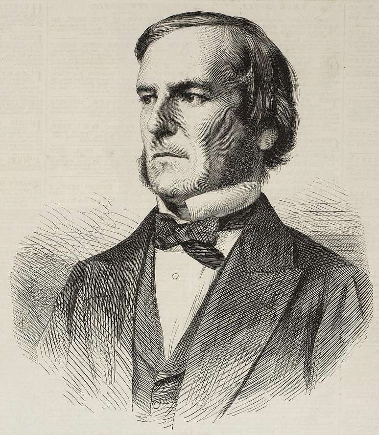 Sua tese combinou seu interesse pela lógica de George Boole (aqui em uma ilustração) e pela construção de computadores