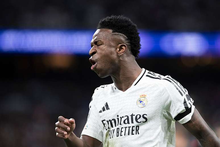 Vini jr celebra gol contra o Arsenal na Champions