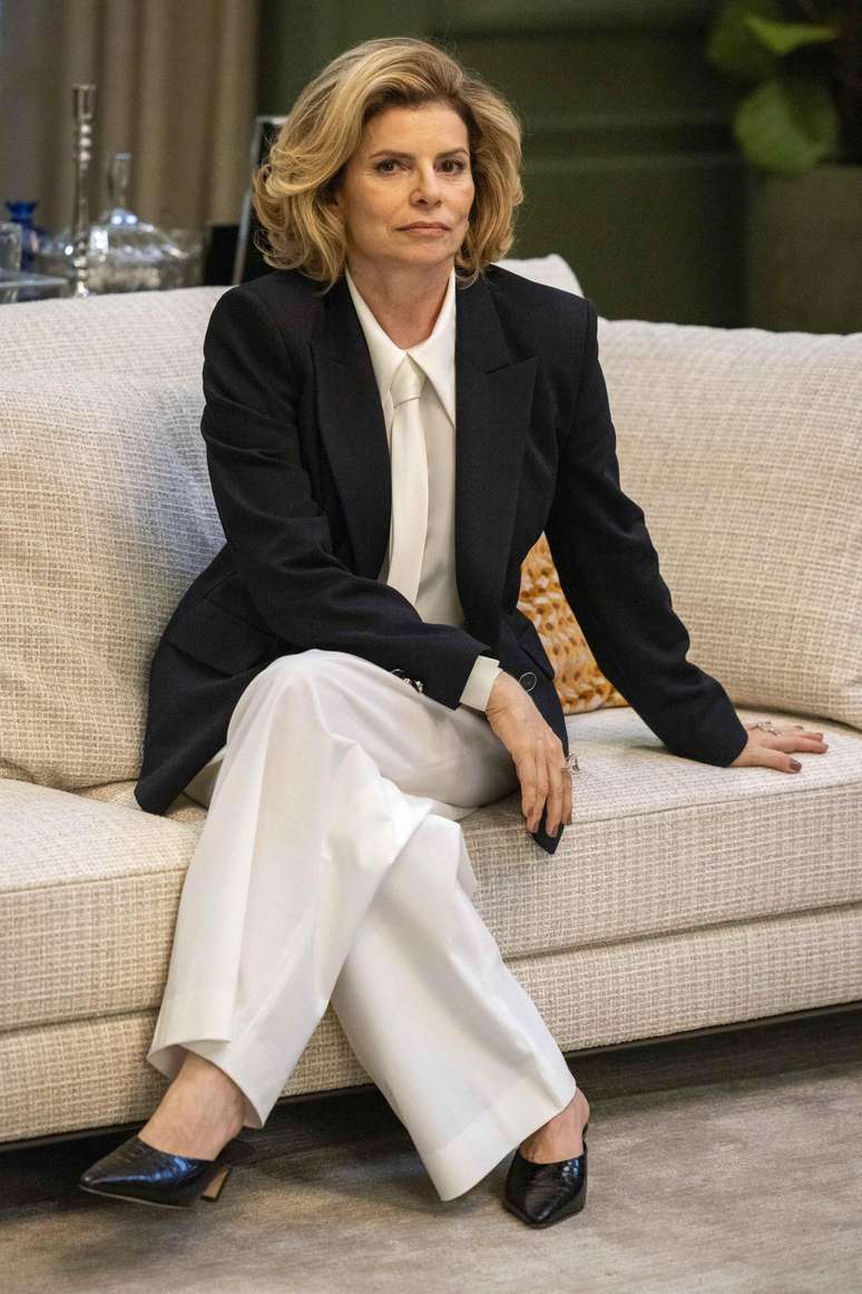 Debora Bloch como Odete Roitman 