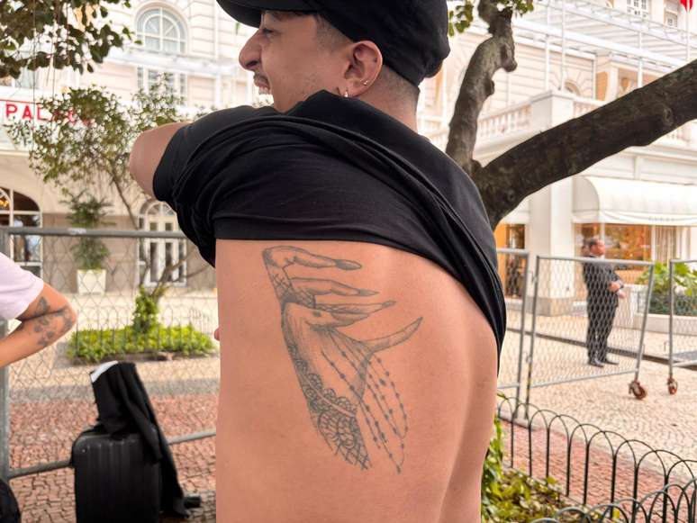 Paix&atilde;o tatuada na pele