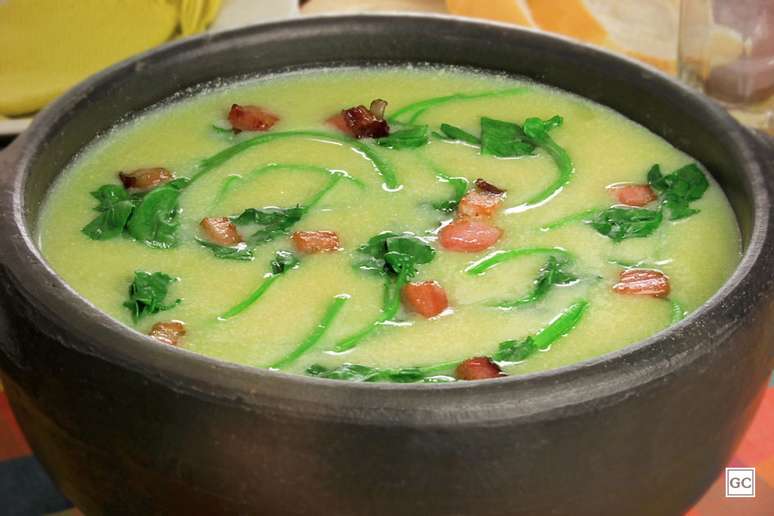 Green broth with bacon and crescen: warm and tasty Green broth with bacon and crescen: warm and tasty