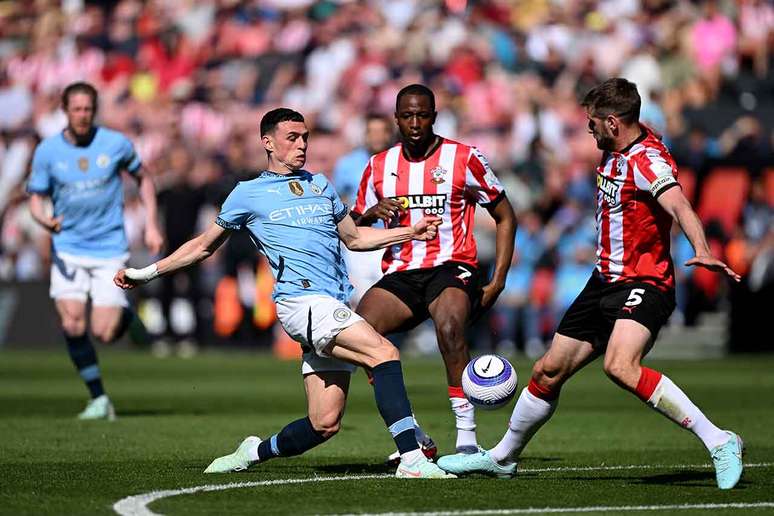 Phil Foden, of City, is blocked by Aribo, by Southampton Phil Foden, of City, is blocked by Aribo, by Southampton