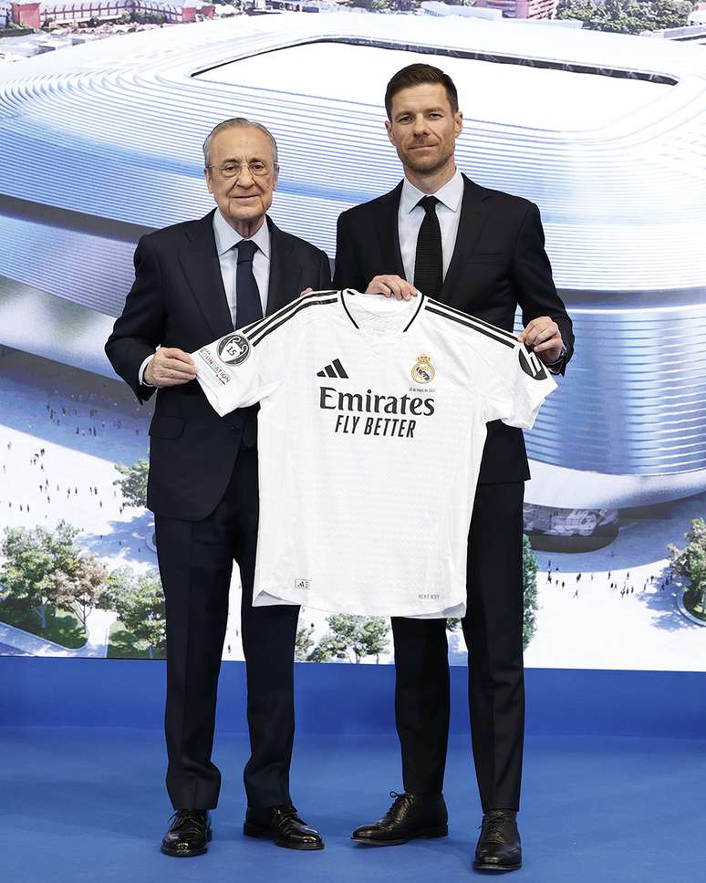 Xabi Alonso e Florentino Perez 