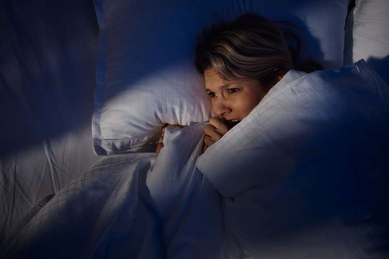 What does it mean when a person is afraid of darkness, according to psychology?
