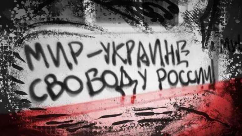 Um grafite que diz: 'Paz para a Ucr&acirc;nia, Liberdade para a R&uacute;ssia'