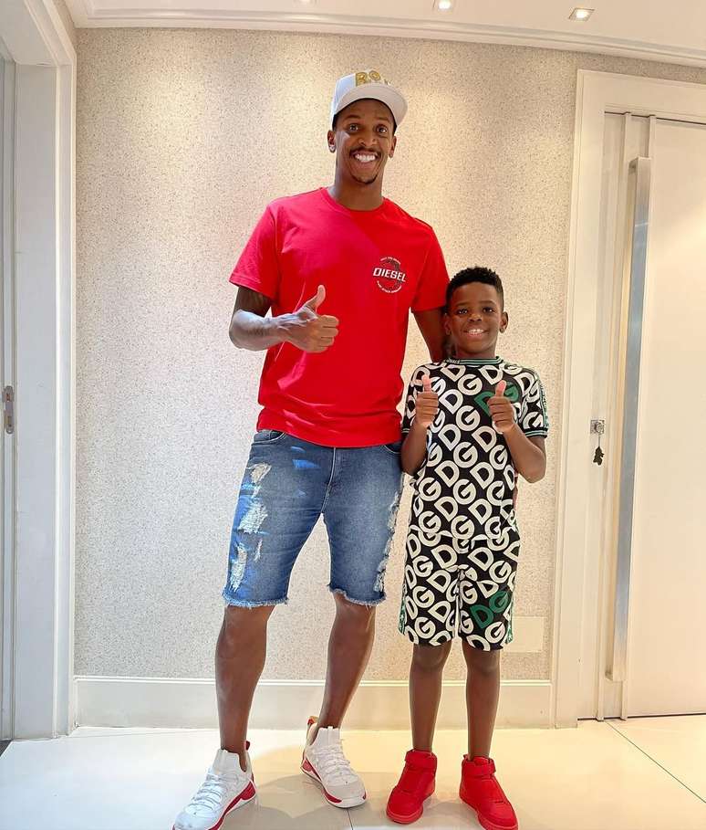 Jo footballer and one of his children Jo footballer and one of his children