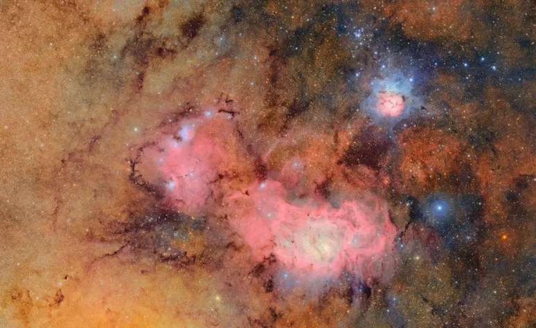 A primeira imagem revelada pelo telesc&oacute;pio Vera Rubin mostra as nebulosas Tr&iacute;fida Lagoa em detalhes impressionantes