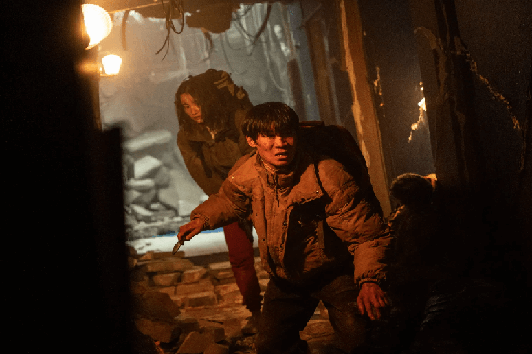 Em “Barganha”, participantes de um leilão ilegal de órgãos humanos lutam pela sobrevivência após um terremoto 