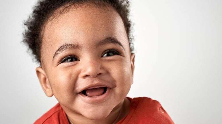 Children start laughing about three months
