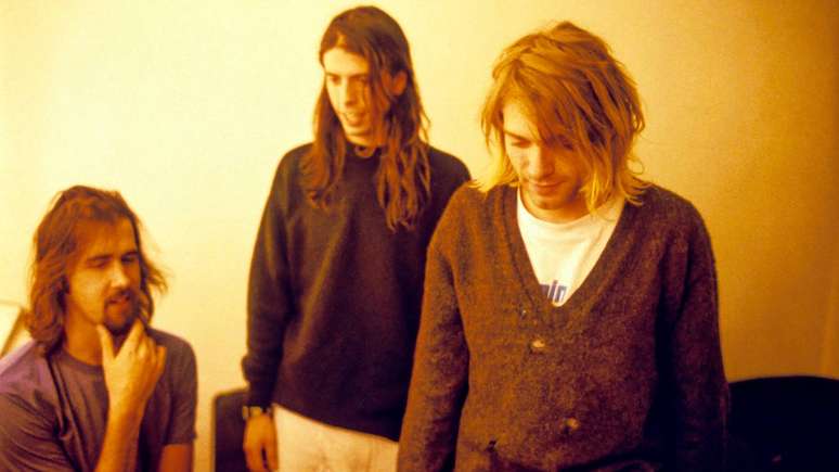 Nirvana em 1991 (E-D): Krist Novoselic, Dave Grohl e Kurt Cobain -