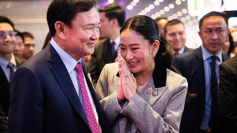 Paetongtarn Shinawatra com seu pai, Thaksin