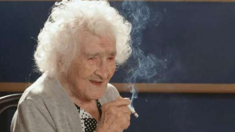 French Jeanne Calment (1875-1997) smokes a cigarette calmly, celebrating his 117th birthday French Jeanne Calment (1875-1997) smokes a cigarette calmly, celebrating his 117th birthday