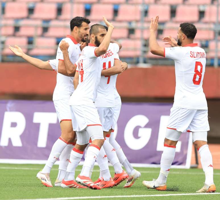 Sele&ccedil;&atilde;o Tunisiana comemorando um gol 