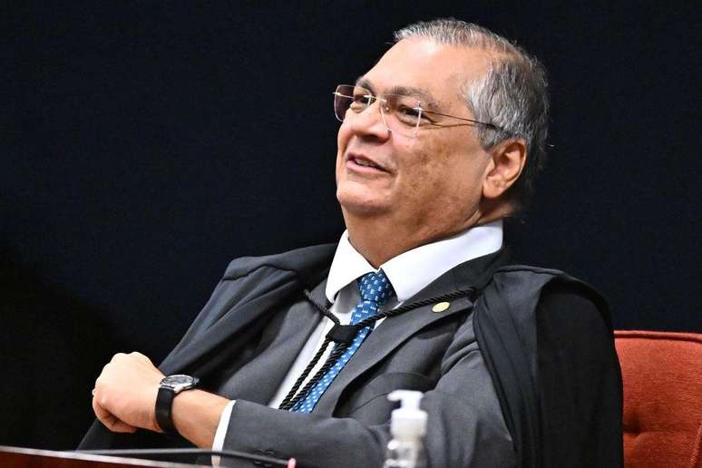 Dino fez refer&ecirc;ncia &agrave;s press&otilde;es dos EUA dizendo que 'nem o Mickey' mudaria julgamento no STF