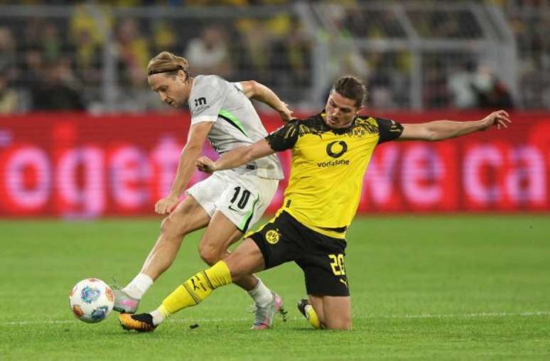 Dean Mouhtaropoulos/Getty Images - Legenda: Borussia Dortmund conquistou importante vitória em casa