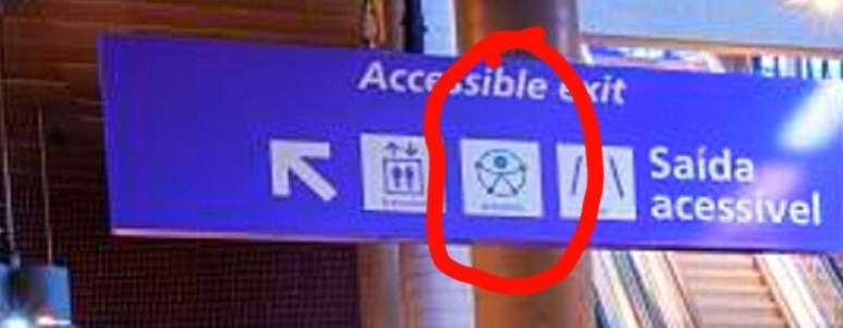 Desenho (circulado em vermelho) foi criado pela ONU em 2013, mas n&atilde;o &eacute; um s&iacute;mbolo oficial de acessibilidade e n&atilde;o est&aacute; regulamentado no Brasil.